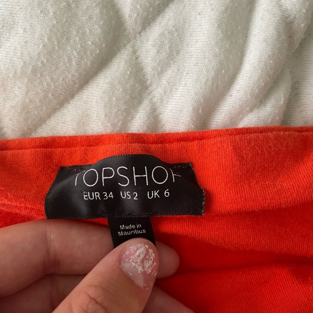 Orange cropped tube top